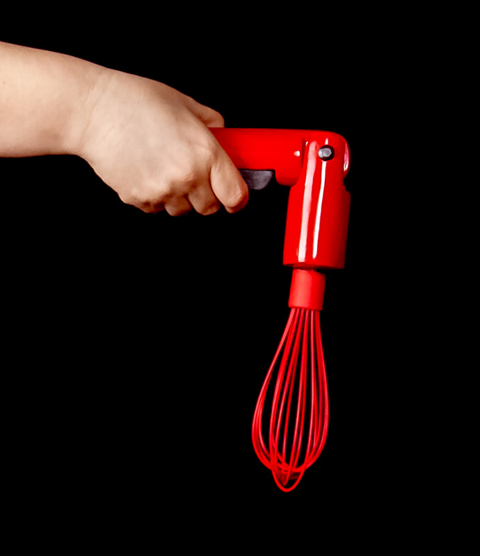 Holding the ergo whisk in the folded position